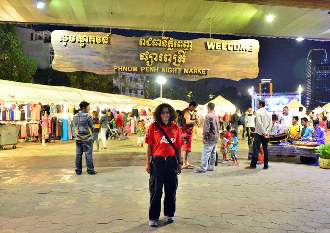 a-cool-girl-taking-a-photo-at-the-phnom-penh-night-market