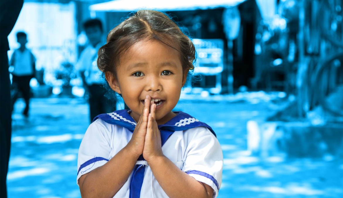 a-little-girl-in-cambodia-performs-namaste-as-a-friendly-salute
