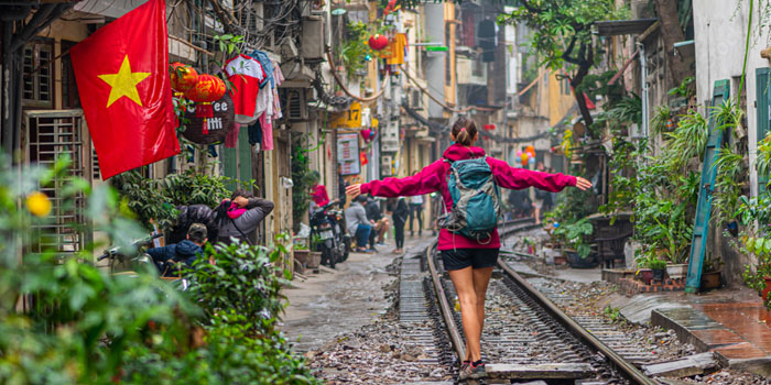 a-tourist-carrying-small-bag-traveling-in-vietnam