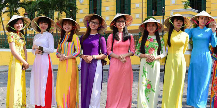 https://www.indochinatour.com/assets/images/Vietnam/vietnam-traditional-dress.jpg
