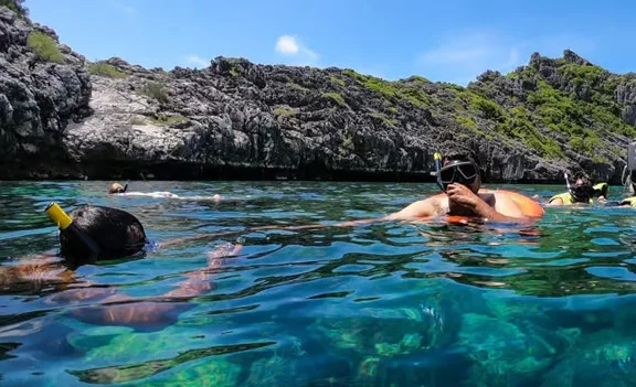 Snorkeling and kayaking in Ang Thong National Marine Park near Koh Samui, Thailand