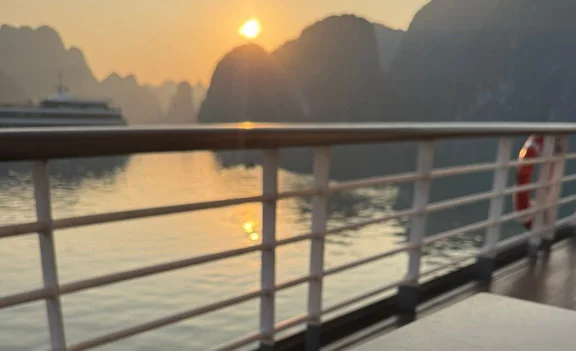 Morning coffee overlooking Bai Tu Long Bay during Sharon's overnight cruise in Vietnam