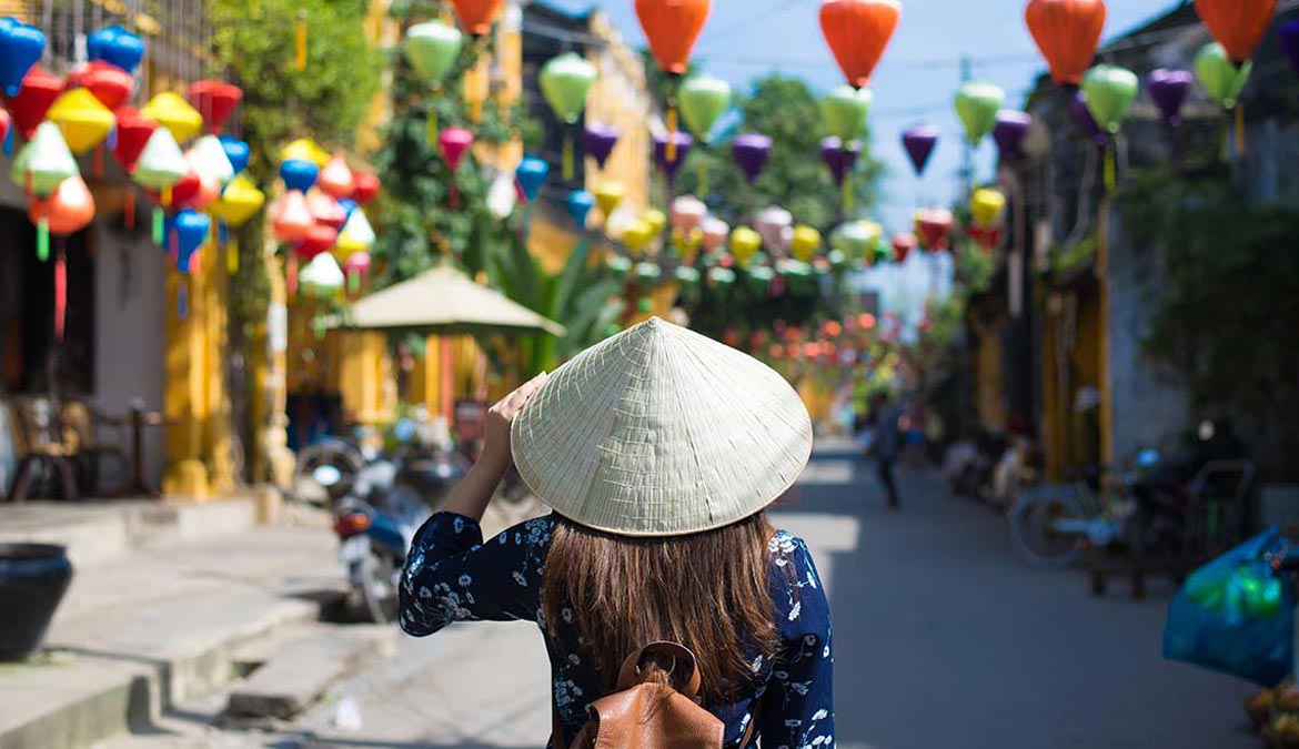 Vietnamese Street Crossing - i Tour Vietnam Travel Guides